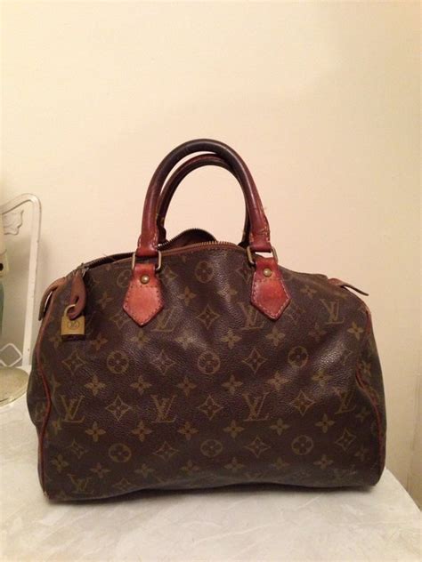 louis vuitton bag repair policy